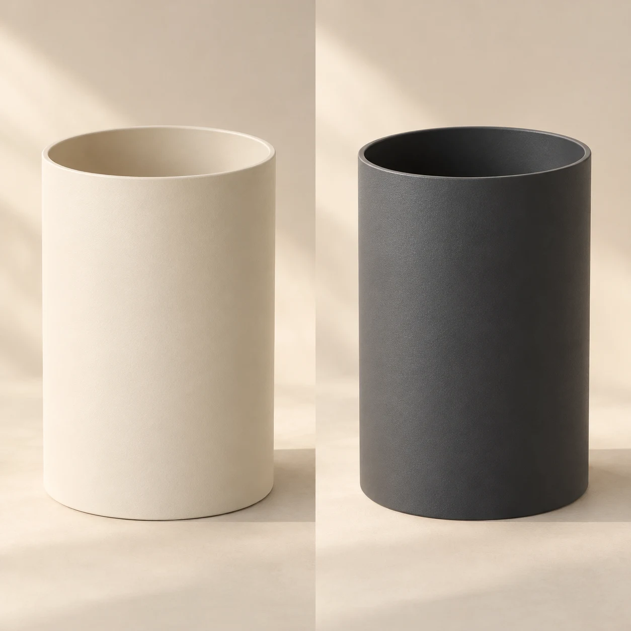 Tall Form Planter, Bone on the left and Graphite on the right